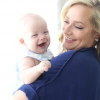 mom and happy breastfed baby